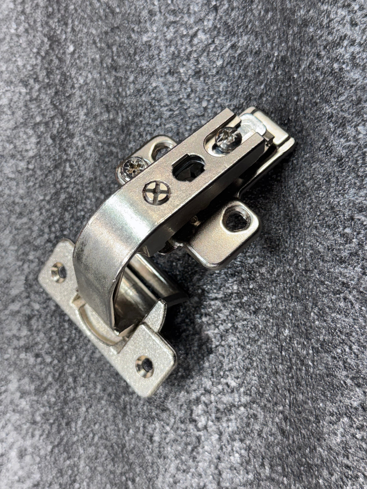 Grass/Mepla 699.299.05.00 bifold corner cabinet hinge with baseplate.