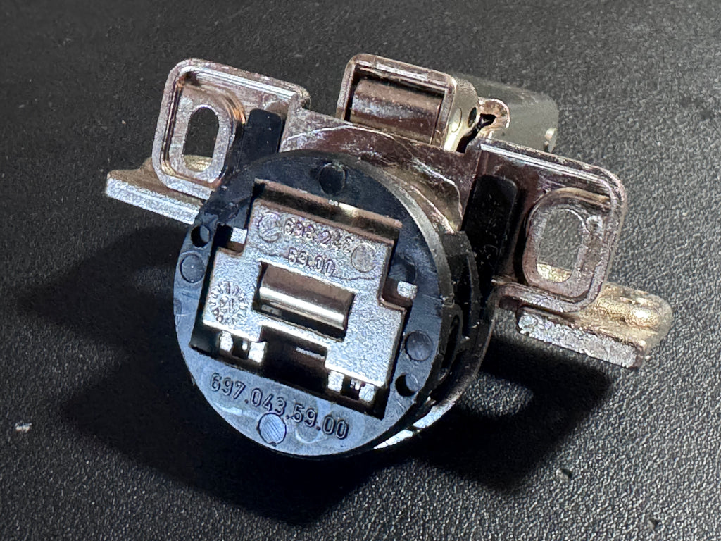 This listing offers ONE (1) genuine MEPLA cabinet hinge, identified by part number 698.243.59.00, with additional reference numbers 697.043.59.00 and 511.243.01.92.

