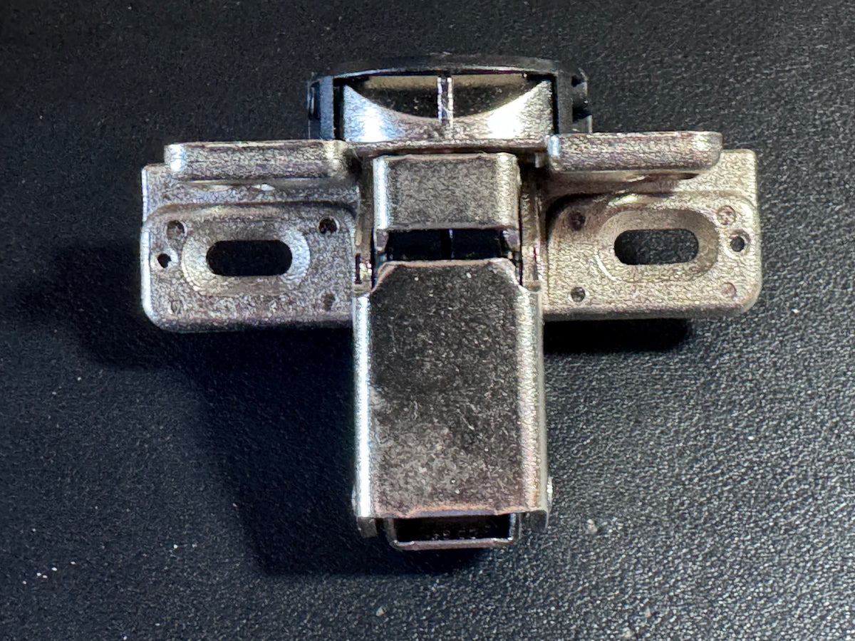 This listing offers ONE (1) genuine MEPLA cabinet hinge, identified by part number 698.243.59.00, with additional reference numbers 697.043.59.00 and 511.243.01.92.

